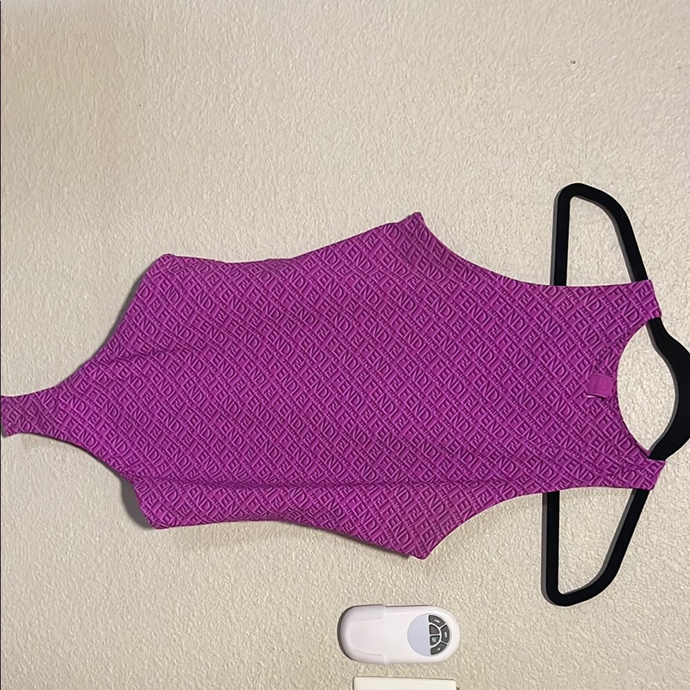 XL Skims and Fendi collab body suit.